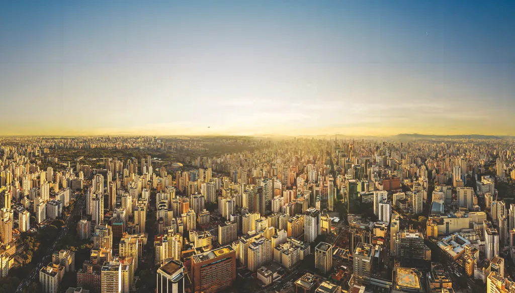 Foto aérea da região do Paraíso onde fica o Sync Ibirapuera, com o Parque Ibirapuera ao fundo