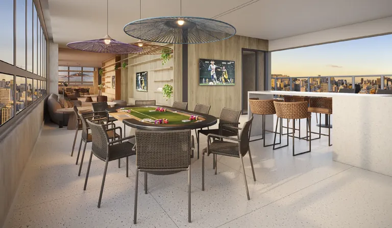 Sports bar do rooftop, com mesa de jogos, TVs e bancada alta